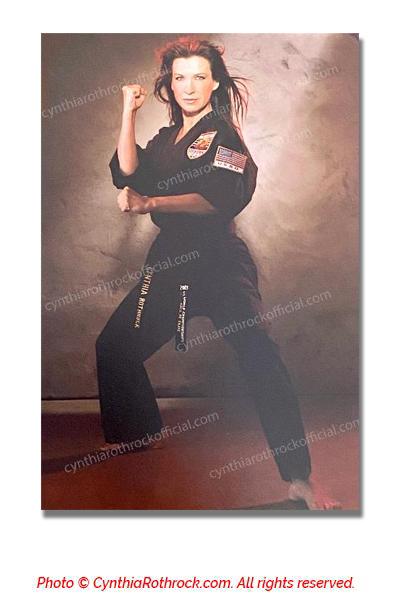 Cynthia Rothrock Autographed Back Stance with Black Uniform photo